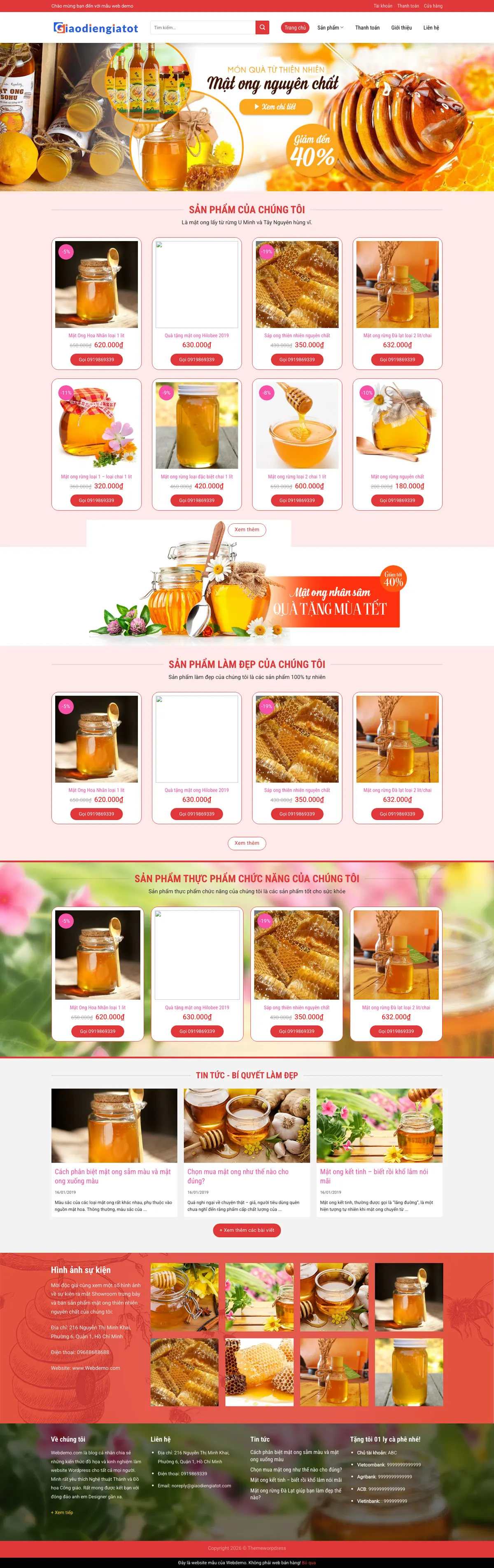 Màn hình đầu mẫu website mật ong tông đỏ hồng với banner quà tặng